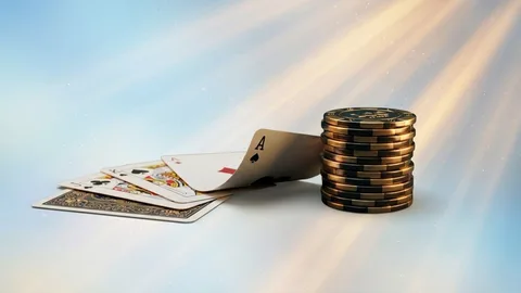 Mesa de baccarat en vivo con cartas y fichas doradas
